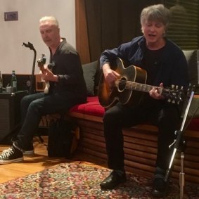 Nick Seymour and Neil Finn play along to the new Crowded House album in Finn’s Auckland studio last month.