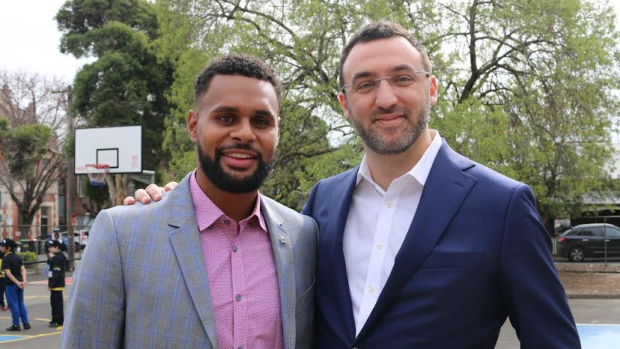 Ambitious plans: NBL general manager Jeremy Loeliger with San Antonio guard Patty Mills.