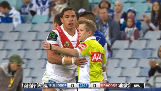 In trouble: Tyson Frizell touches referee Chris James on Friday night.