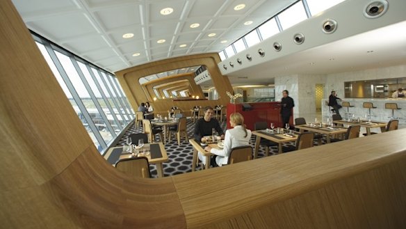 Smart casual: Qantas is enforcing a smarter dress code in its lounges.