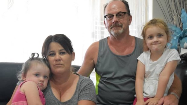 Mandii Tennick with her husband Gari and two grandchildren, Isabella Daniels (left) and Maddysan Daniels (right), who were happy Mandii had returned home after the ordeal.