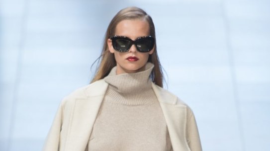 Winter coats were on the runway, but were rare as hen's teeth in the crowd.