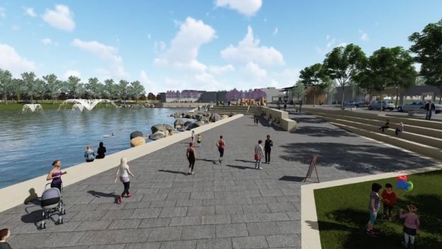 The first glimpse of the development shows a man-made lake with boardwalk, cafes, shops and community services.