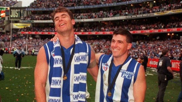 Wayne Carey and Anthony Stevens as teammates, after the 1996 Grand Final won by North Melbourne.