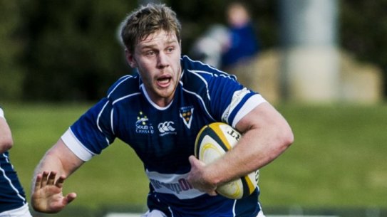 Royals' Tom Staniforth looks for a gap in Gungahlin's defence.