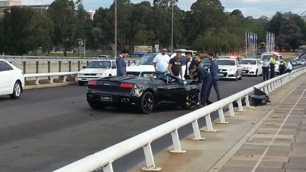 Motorists faced delays when a black Lamborghini  crashed into a guardrail on the Commonwealth Avenue Bridge. Police were called to the single-vehicle smash on Sunday, April 5.