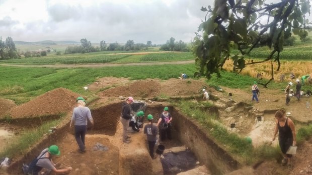 Students carry out excavation of a Transylvanian cemetery in Romania. 
