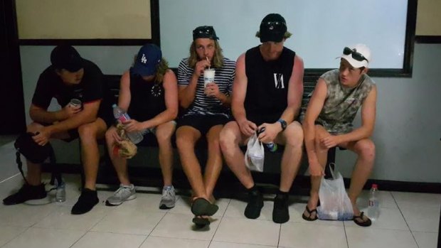 Friends of Jamie Murphy's await at the Kuta police station, Bali.