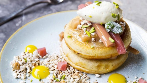 Pancakes with poached rhubarb, puffed grains, toasted hazelnuts and creme fraiche at St Ali in South Melbourne.