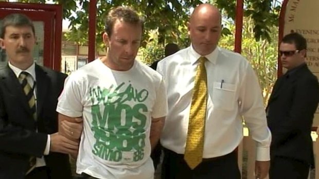 Sean Waygood is led away after his dramatic arrest at a cafe on Sydney's north shore in January 2009.