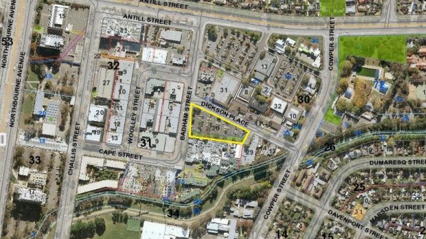 Woolworths has again expressed interest in buying the Dickson carpark, bordered in yellow, that the company missed out on when a controversial tender was awarded to the Tradies Club.