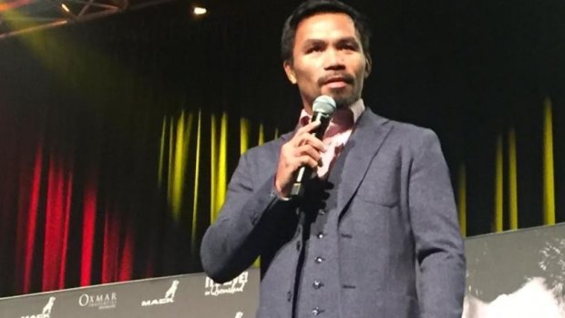 World welterweight champion Manny Pacquiao on stage at Brisbane's Convention and Exhibition Centre.