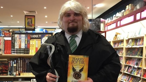 Dymocks' employee and Harry Potter fan Jacob Lawlor dressed to resemble Lucius Malfoy.