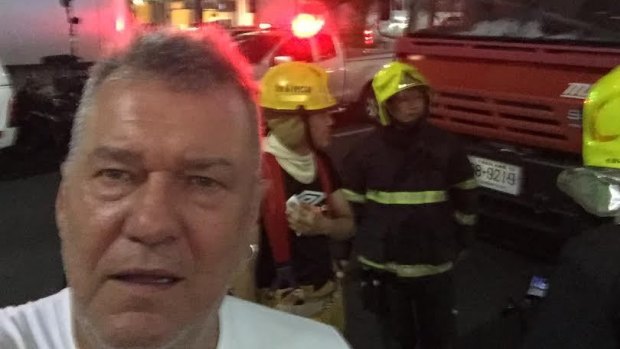 Close call ... Jimmy Barnes at the scene of the massive bomb blast in Bangkok.