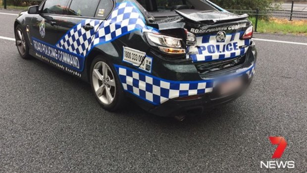 A police officer has been taken to Gold Coast University Hospital in a serious condition after being hit by a car on the Pacific Motorway.