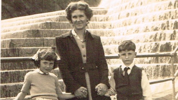Aged six, Jennings is pictured with his mother, Phyliss Jennings, and sister Ruth, aged five.