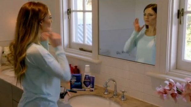 Bachelorette Sam applying her makeup and playing with toothpaste before her big date with Alex.
