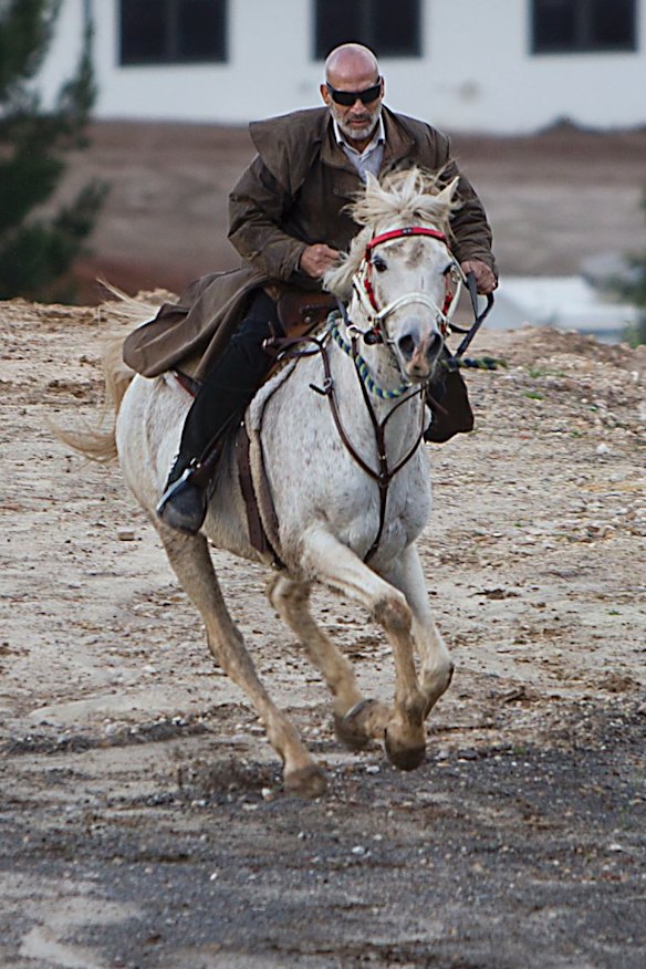 Mamdouh Elomar during a solitary ride at is Sydney property after news his son Momhamed was killed in Syria.