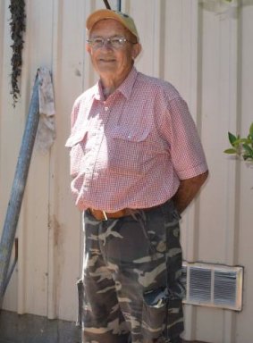 Eric Holland first spotted the giant goanna outside the steps of his shed.