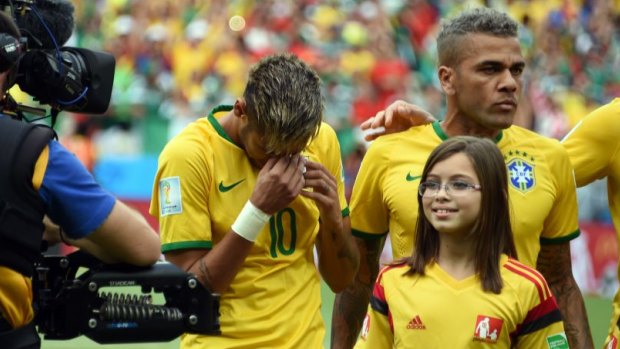 Neymar sheds a tear during the playing of the Brazilian anthem.