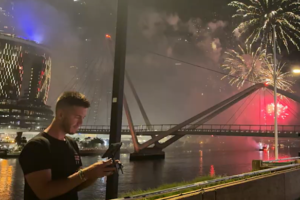 Michael Rubio piloting a gimbal drone during Brisbane’s 2026 New Year’s fireworks show.