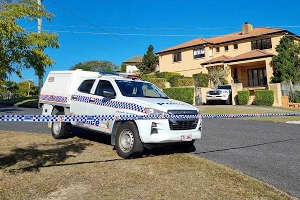 Police at Toutai Kefu’s Coorparoo home on Monday morning.