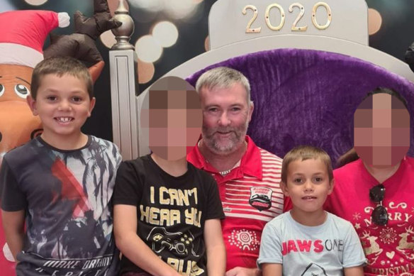 Heartbroken father Joseph Shorey (seated) with Sheldon (right) and Shane (far left). Both boys died in an alleged hit and run accident in Wellington on January 5. 