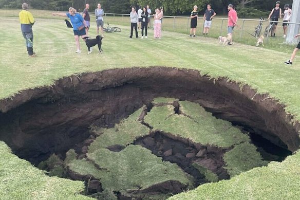 The sinkhole on Monday evening.