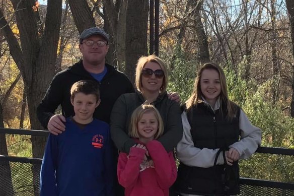 Ian McBeth pictured with his wife and three children