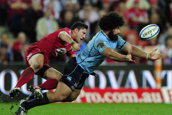 The Reds’ Anthony Fainga’a, left, has left the game due to concern over the long-term effects of head knocks.