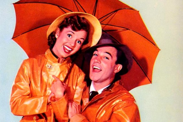 Debbie Reynolds and Gene Kelly in the iconic Singing in the Rain.