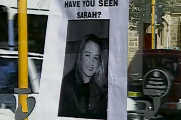 A missing person poster on the public phone booth where Sarah Spiers called for a taxi before she vanished. 