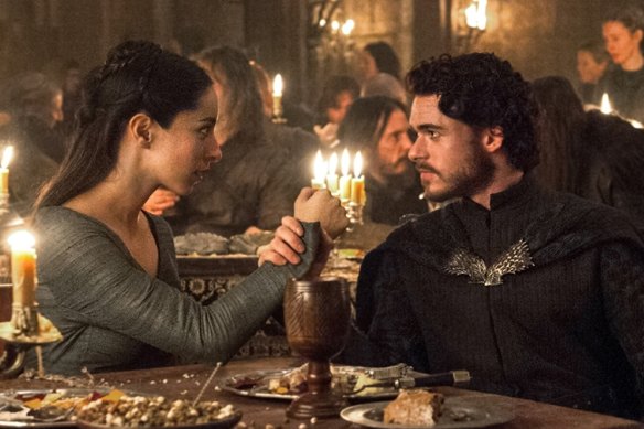 Talisa (Oona Chaplin) and Robb Stark (Richard Madden) in the infamous Red Wedding episode of <i>Game of Thrones</I>. The national conversation is a train-wreck of spoiler warnings in the era of binge-watching.