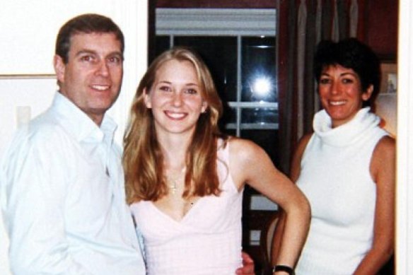 Prince Andrew pictured with Virginia Roberts Giuffre in 2001 at the home of Maxwell (right) in London. 