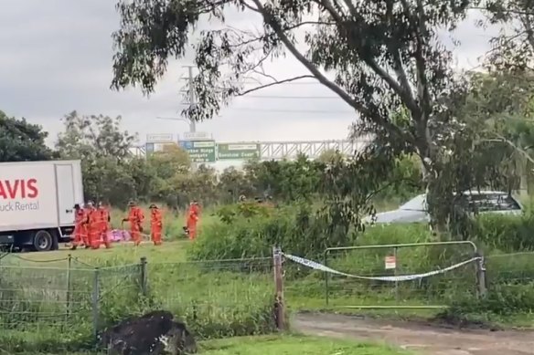 SES personnel search the Taigum property on Wednesday, May 12, after the woman’s death on Saturday.