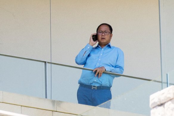 Chinese donor and gambler Huang Xiangmo pictured on the balcony of his Mosman mansion last year.