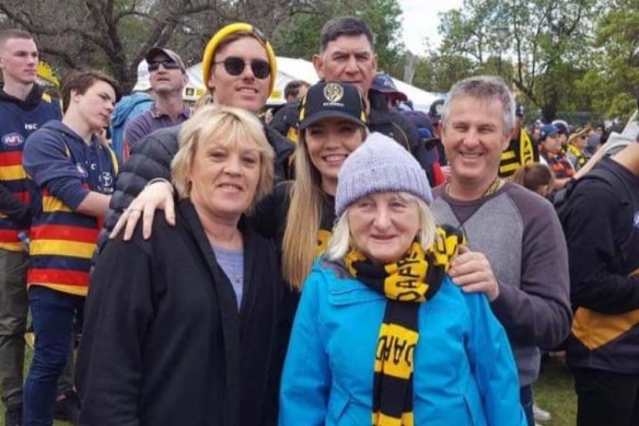 Rosemary Kennedy at a Richmond AFL game with (from left) her daughter Leanne Miles, grandson Zak Kennedy, granddaughter Brodie Miles, son-in-law Andrew Miles (back) and son Robin Kennedy.