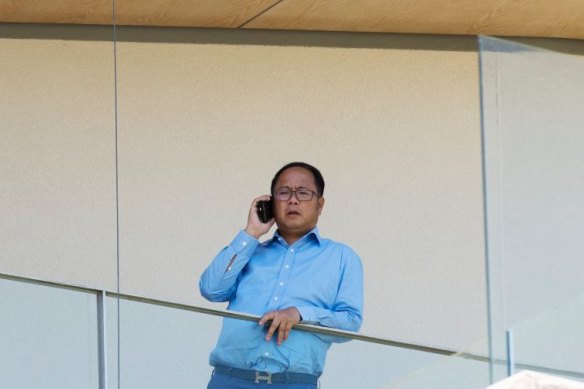Chinese donor and gambler Huang Xiangmo pictured on the balcony of his Mosman mansion last year.