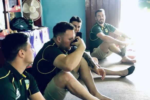 Nathan Brown samples the local brew as part of an official welcoming into Maika Sivo's home in Momi.