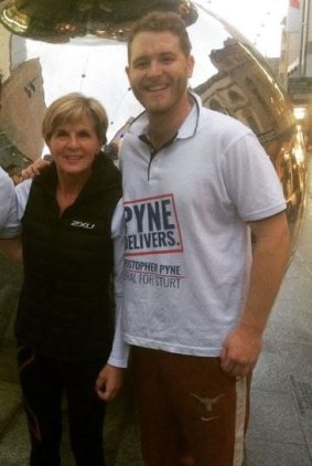 Jack Walker, a staffer for Christopher Pyne, was arrested in Malaysia. He is pictured here with Foreign Affairs Minister Julie Bishop.