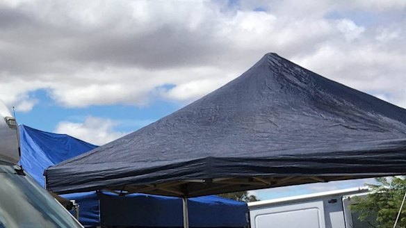 An AFP van at a property in Young where a man was arrested over foreign incursion offences.