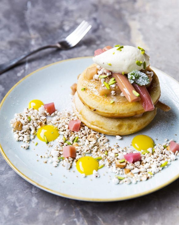 Pancakes with poached rhubarb, puffed grains, toasted hazelnuts and creme fraiche at St Ali in South Melbourne.
