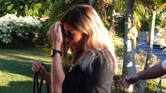 Mercedes Corby arrives at the home of her mother, Rosleigh Rose, in Loganlea, south of Brisbane, on Sunday. 