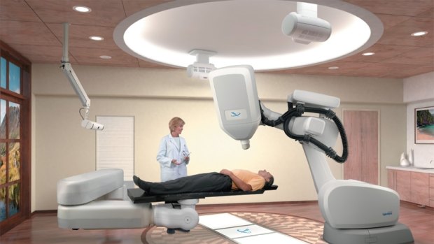 The $9m CyberKnife  hovers over the body, shooting high-dose blasts of radiation at tumours with pinpoint accuracy.