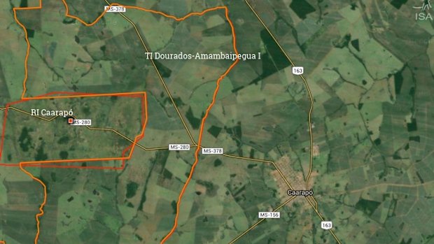 The indigenous reserve (RI) Tey Kue in Caarapo, red outline, left, and the much bigger surrounding indigenous territory (TI) made up of 87 farms in orange.