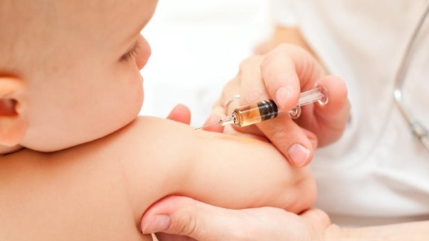 Children receive free polio vaccines in Australia.