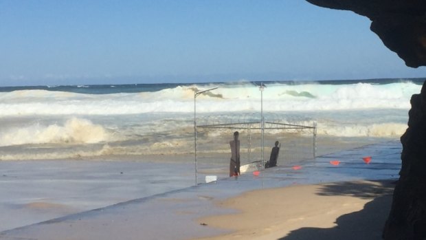 Large swell rolls towards the artwork 'Fair Dinkum Offshore Processing', which was destroyed.