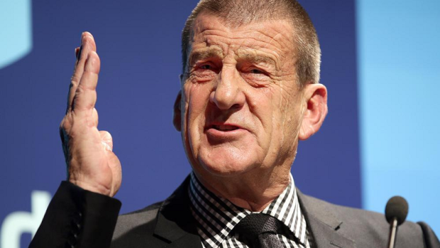 Jeff Kennett has attacked Malcolm Turnbull for engaging in domestic politics while overseas.