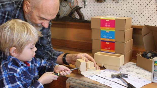 Caspar and Darryl Thompson construct a wooden handmade toy kit for Buildme Toys.