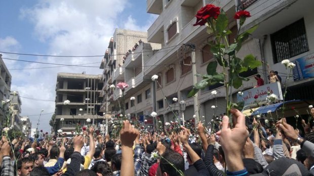 "Flowers were met with bullets, protesters were rounded up en masse and detained": A May 2011 demonstration in the coastal Syrian town of Baniyas.
